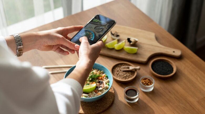 Comparison of a smartphone showing an AI meal planning app interface next to a printed static meal plan from a dietitian