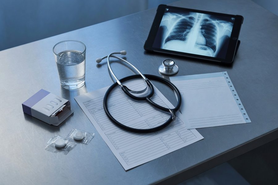 A corridor of radiology viewing stations with AI diagnostic overlays